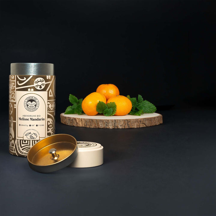 Abendruhe BIO Teedose mit loser Melisse-Mandarine-Teemischung und Mandarinen