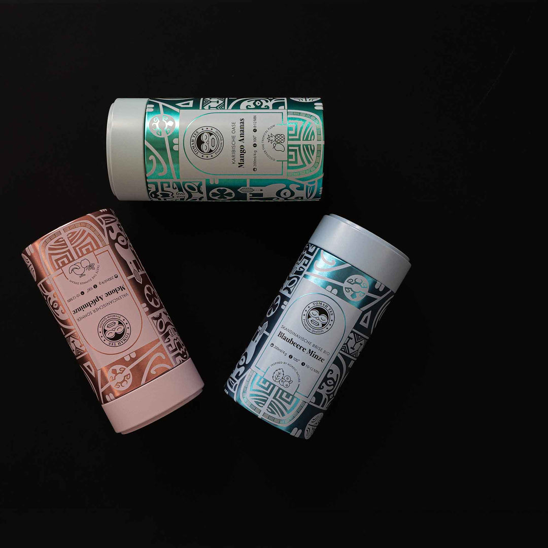 Tomah Tee Urlaubsgefühl Trio mit drei Premium-Teedosen: Mango-Ananas, Blaubeere-Minze und Melone-Apfelminze