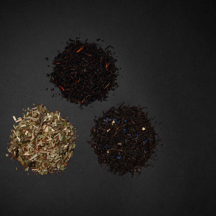 Loser Tee des Rhythmus-Trios: Wildkirsche-Schwarztee, Rooibos-Mate-Zitrone und Earl Grey mit Bergamotte